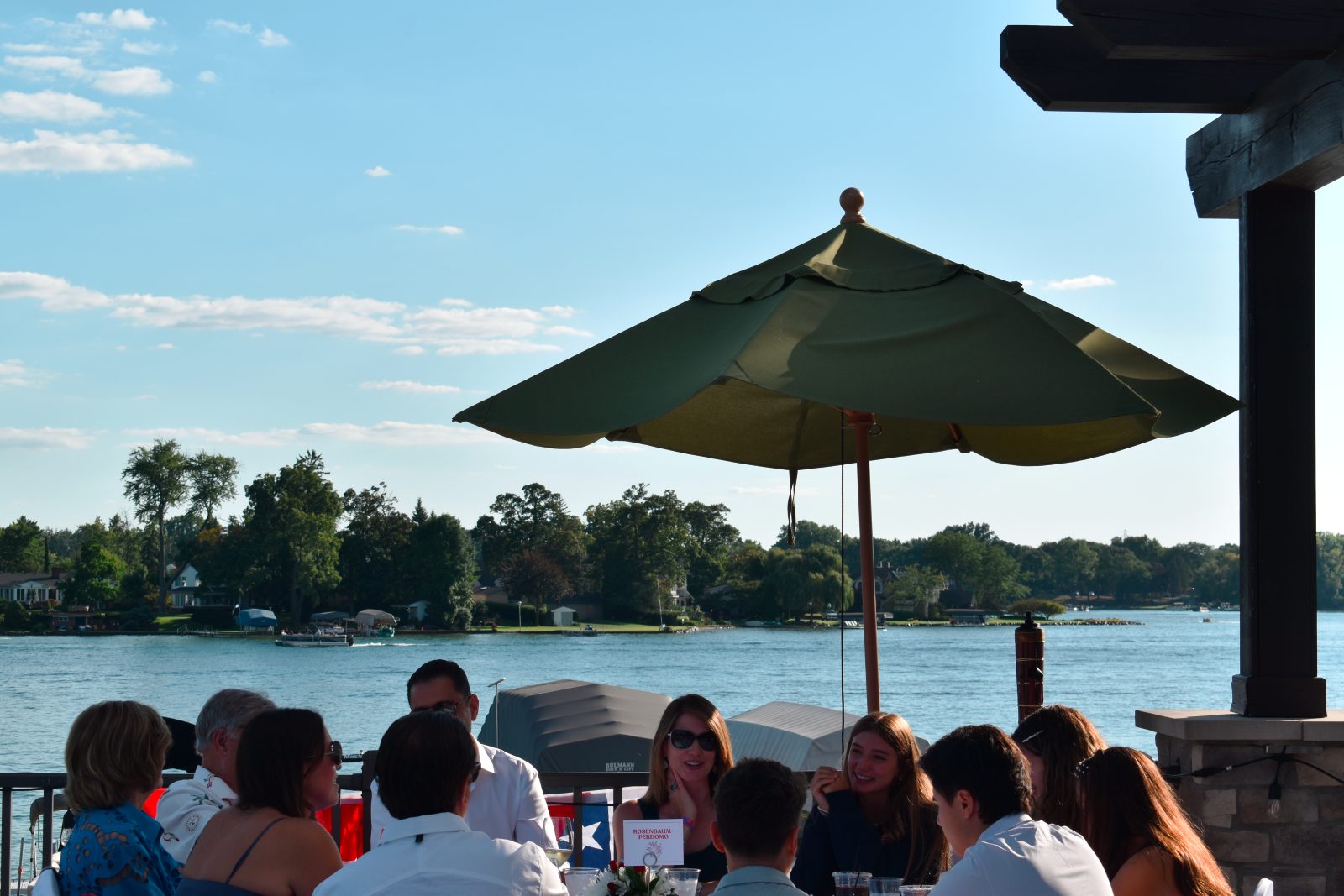 Members dining on the waterfront terrace